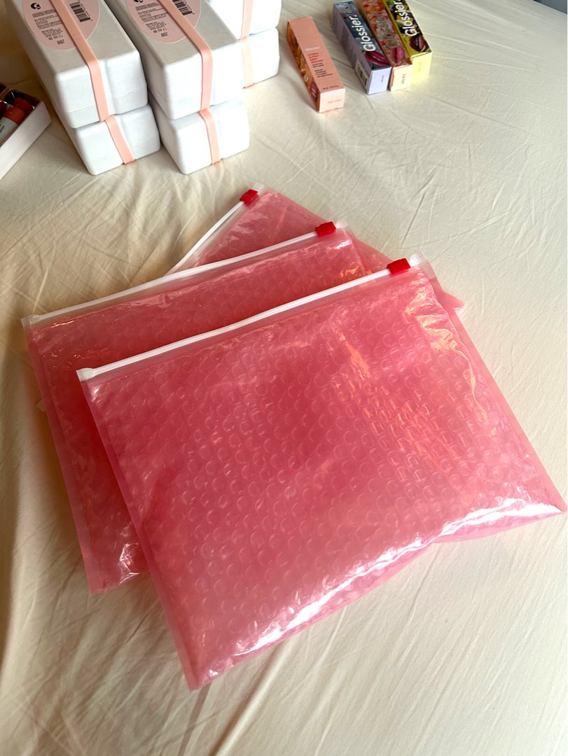 glossier pink bubble wrap ziplock travel bag