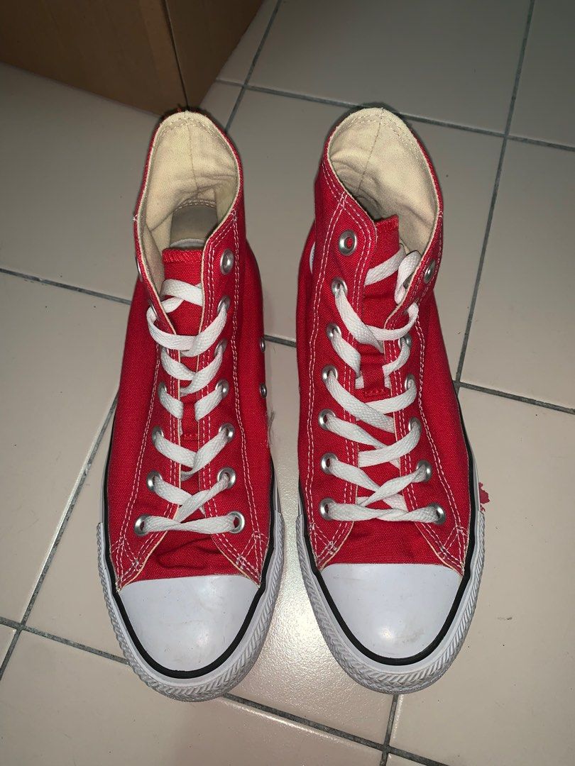 Red high top chuck taylors on sale