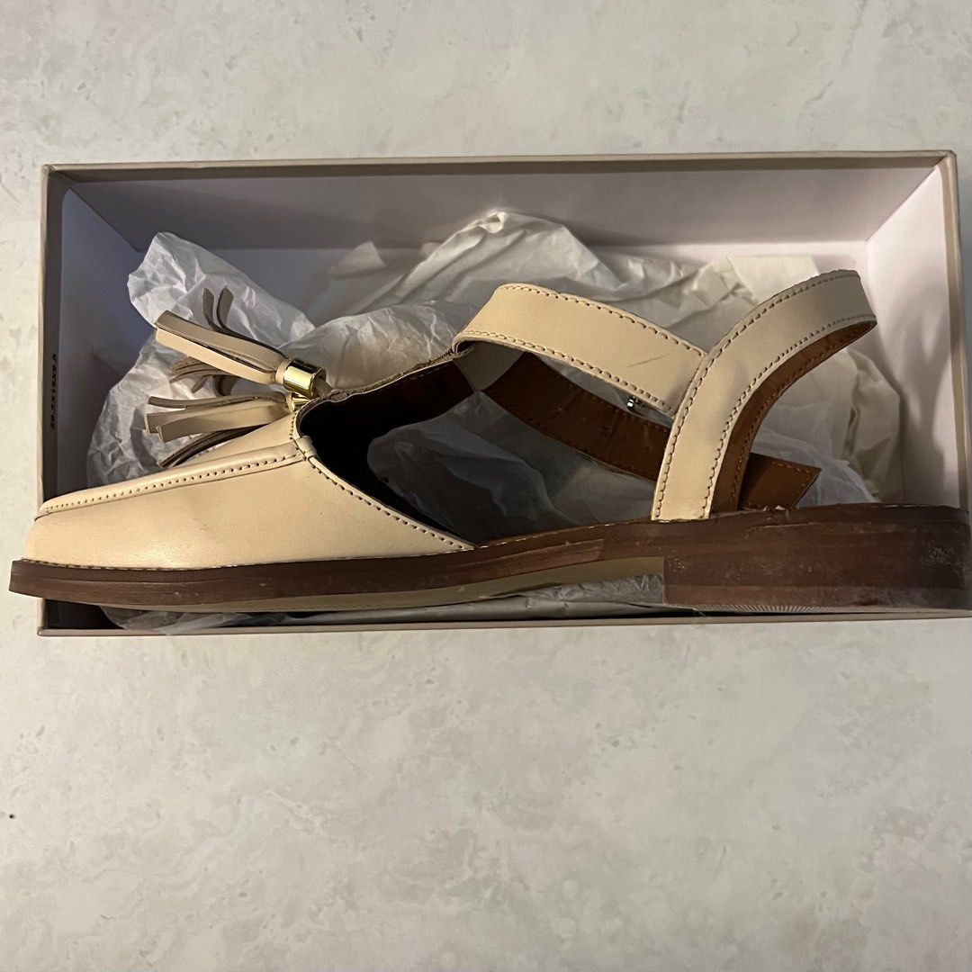 Leather Mary Janes flat shoes with tassels in cream ivory off
