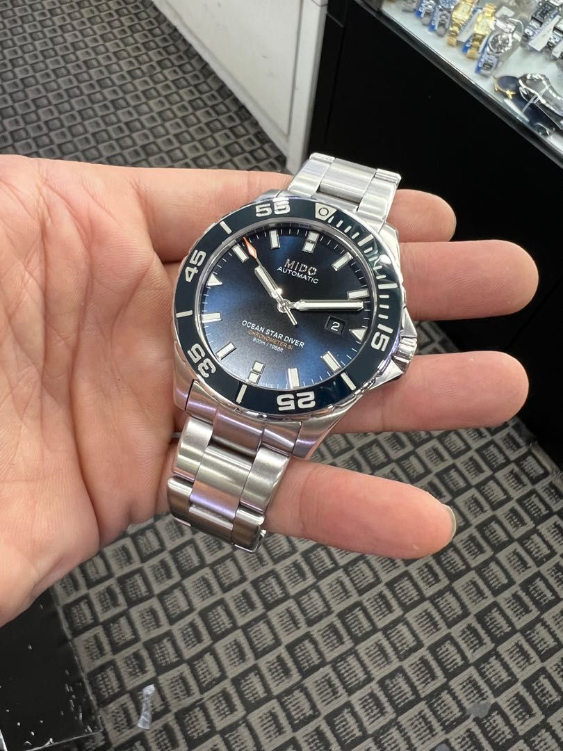 Oris aquis vs mido ocean cheap star