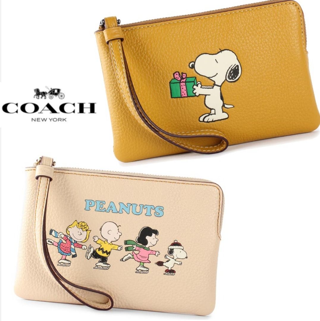 Coach snoopy wristlet online