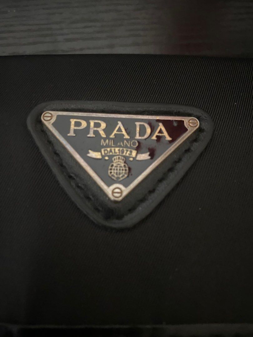 Prada Men's Black Logo-plaque Crossbody Bag, Luxury, Bags & Wallets on  Carousell