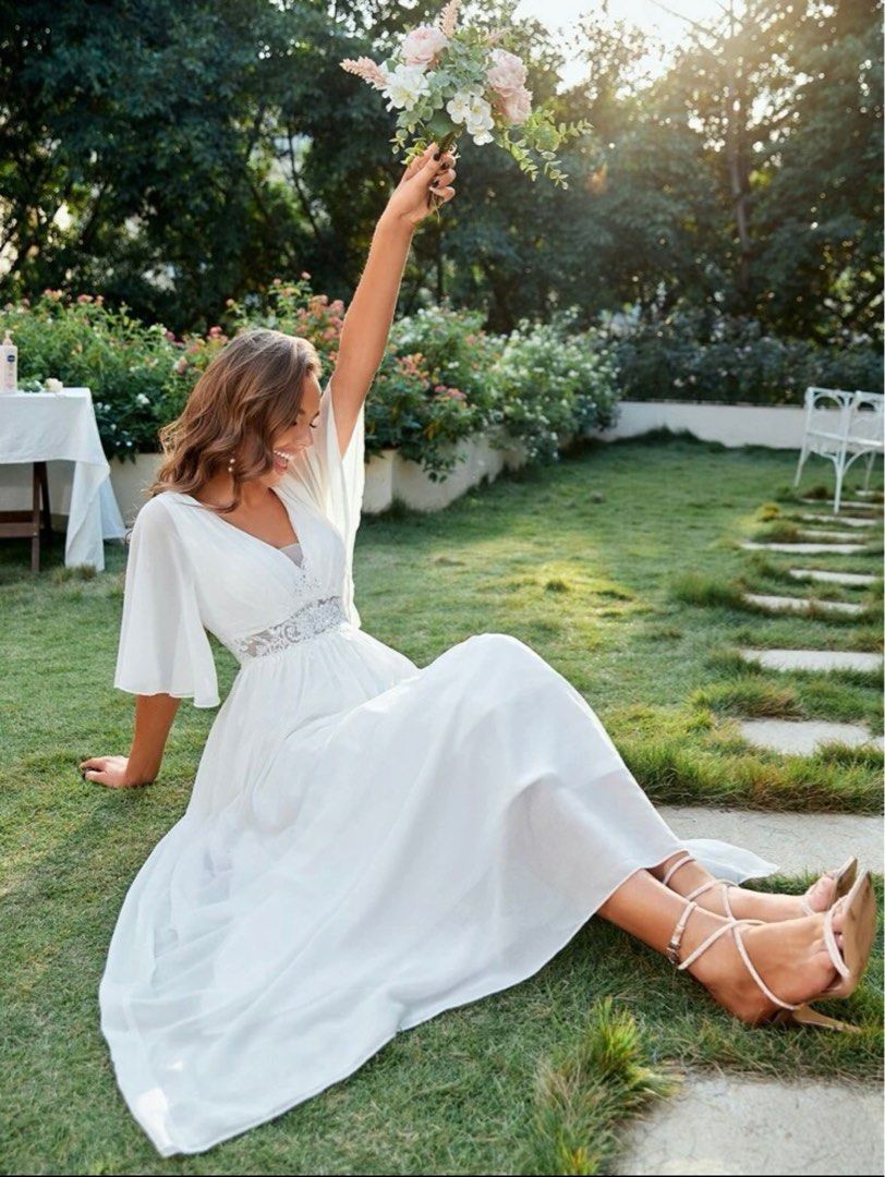 White butterfly sleeve wedding dress