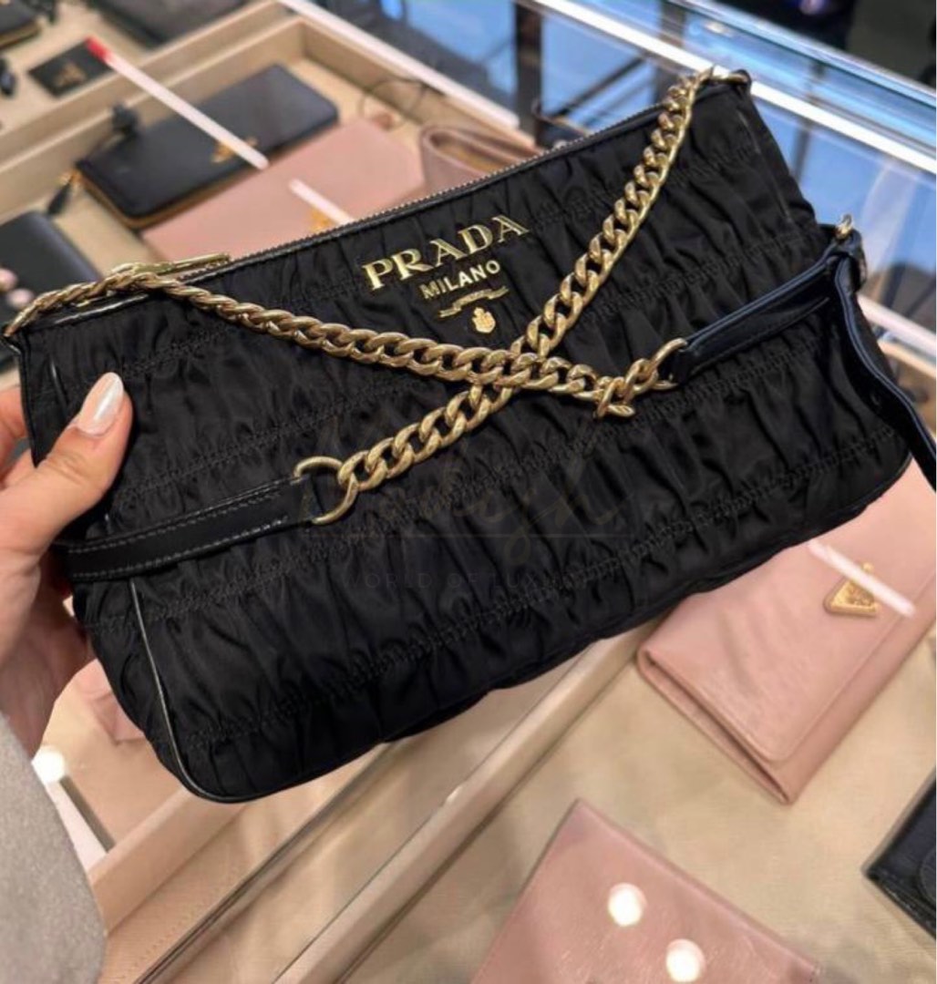No flaws Silver Hardware Prada wd coin purse, Women's Fashion, Bags &  Wallets, Cross-body Bags on Carousell