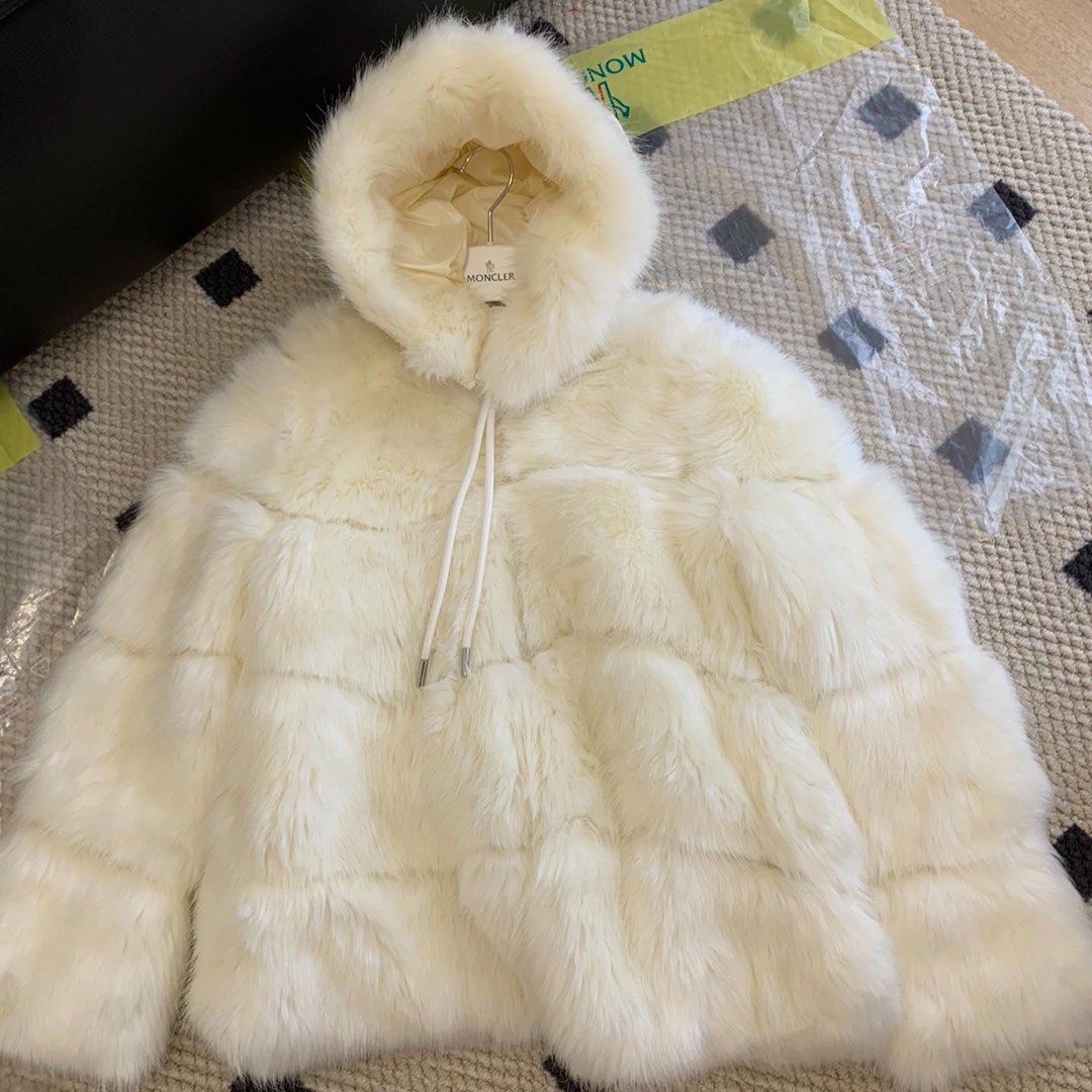 White and black best sale fur jacket