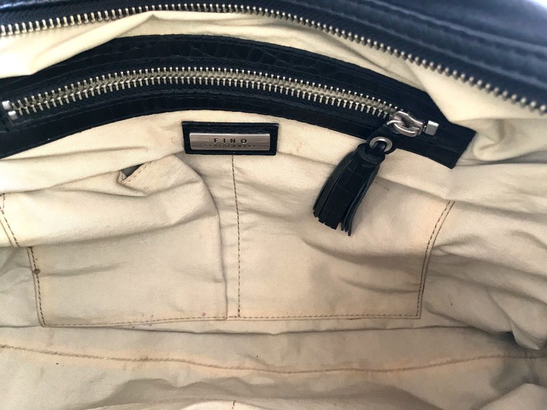 Fino Leatherware Black Bag (Category: Shoulder Bags) located in Taguig. Submitted by thrift4paws (Listing ID 1199841002, Image 2). Description: Black Fino Leatherware bag. Classic Style for such a roomy bag. Perfect for everyday use..