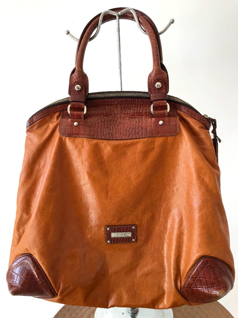 Fino Shopper's Bag (Category: Tote Bags) located in Taguig. Submitted by thrift4paws (Listing ID 1199840438, Image 2). Description: Fino Leatherware bag. Great size for work, shopping or hauling your kids' travel essentials..