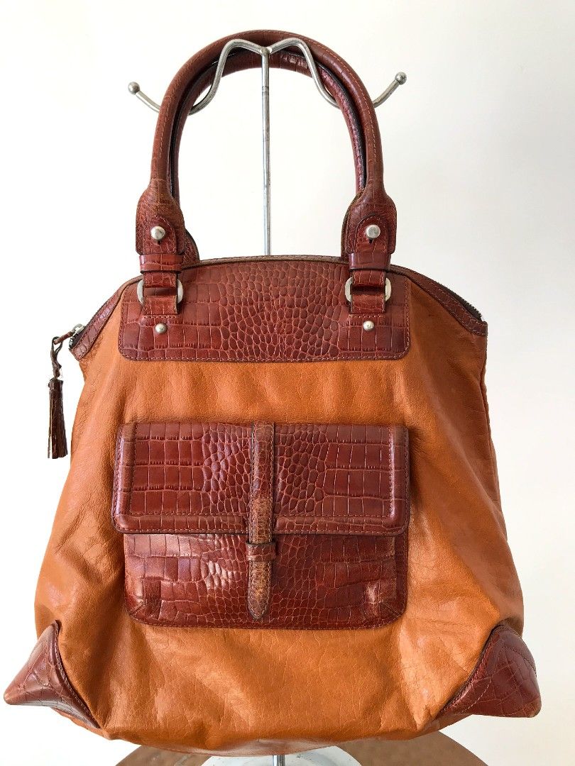 Fino Shopper's Bag (Category: Tote Bags) located in Taguig. Submitted by thrift4paws (Listing ID 1199840438, Image 1). Description: Fino Leatherware bag. Great size for work, shopping or hauling your kids' travel essentials..