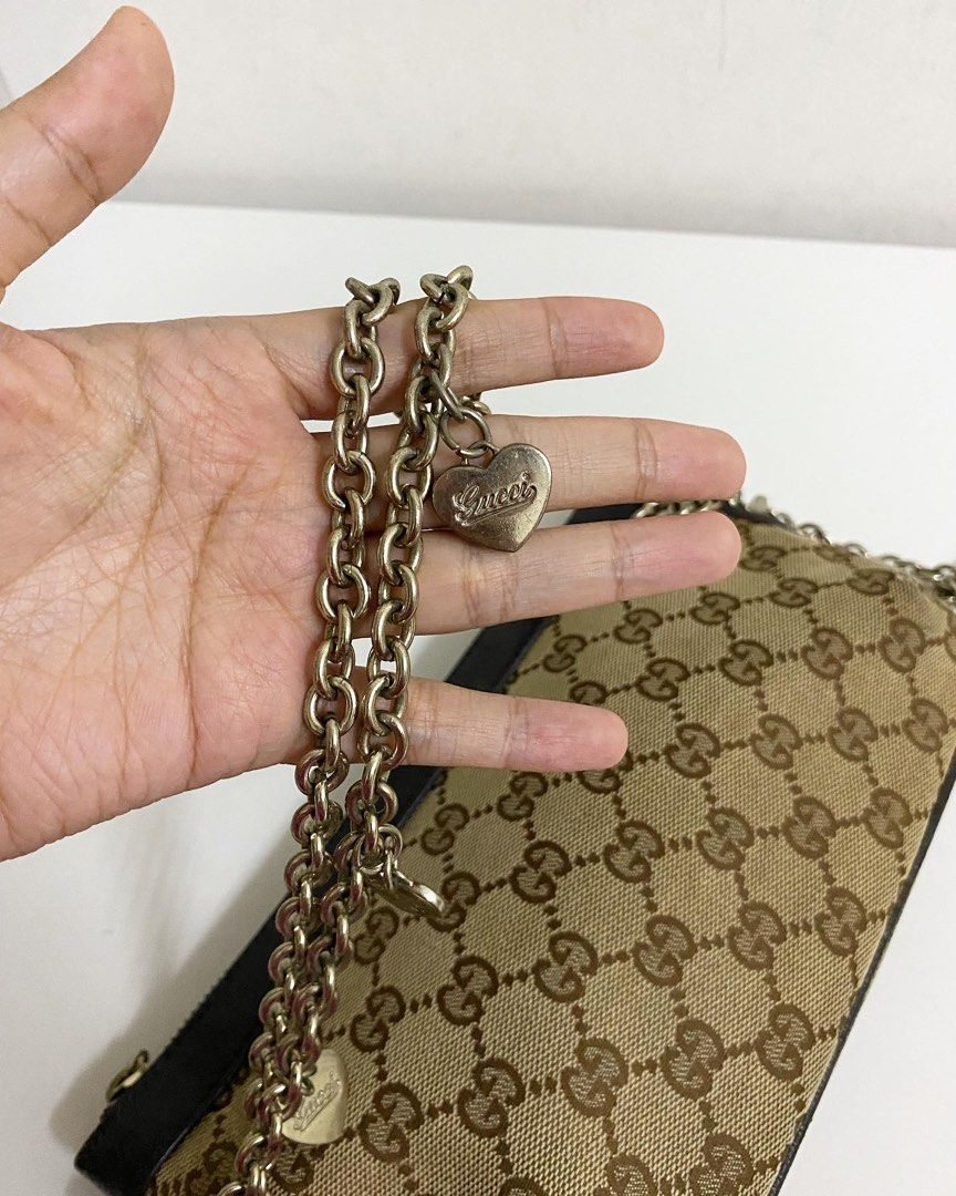 Gucci GG Monogram Guccissima Leather Chain with Heart Charms Silver Pochette  Bag, Luxury, Bags & Wallets on Carousell