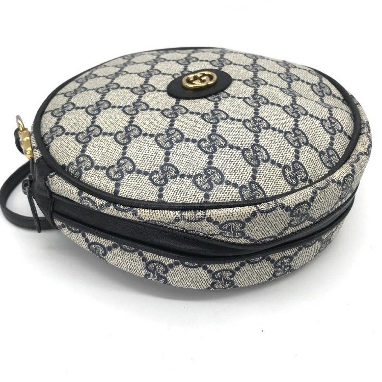 Gucci Vintage Round Navy Blue Monogram Leather Bag – Amarcord Vintage  Fashion