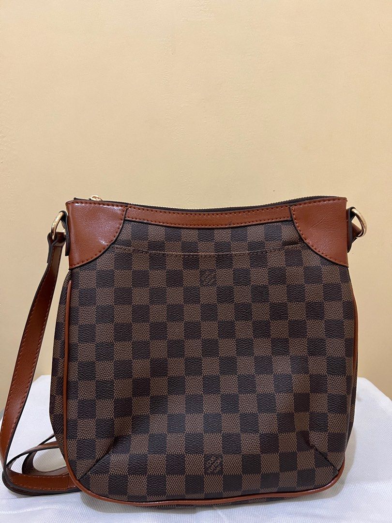 L.V Odeon damier (Category: Luxury Bags & Wallets) located in Caloocan City. Submitted by thrifter_mnl (Listing ID 1194462446, Image 1). Description: Japan sourced Coded No flaws Crossbody and shoulder bag.