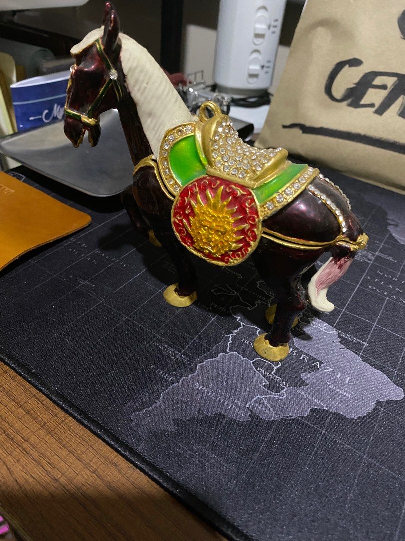 Metal horse jewelry container (Category: Accessory Holder, Box & Organizers) located in Pasig City. Submitted by jack81472 (Listing ID 1194536686, Image 2). Description: Metal horse which can be used to store jewelry, coins, etc. Bought from the US. Height is about 5 inches and length is also about 5 inches when closed (double the length when opened). .