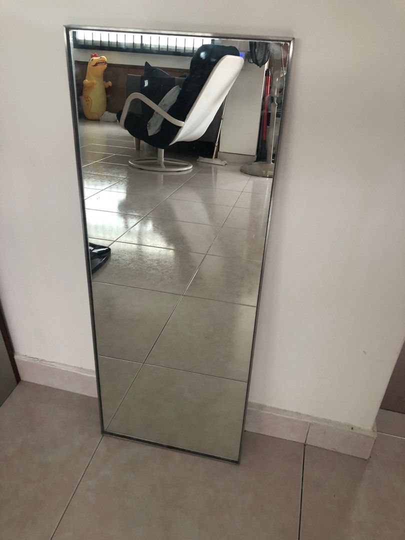 Rectangular mirror (Category: Mirrors) located in Singapore. Submitted by kseebuysellstuff (Listing ID 1194427302, Image 1). Description: 79cm (length) x 31cm (width) Silver frame Have 2 pieces (buy both $25) Cash and carry .