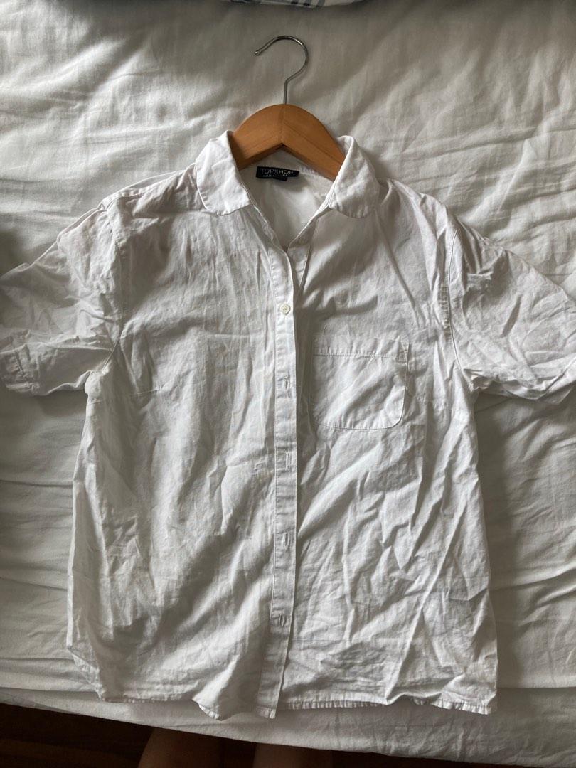 White button down (Category: Blouses) located in Singapore. Submitted by sellingpigs (Listing ID 1194419486, Image 1). Description: White short sleeve button down No stains in good condition Good for work and/or casual fit UK8 .