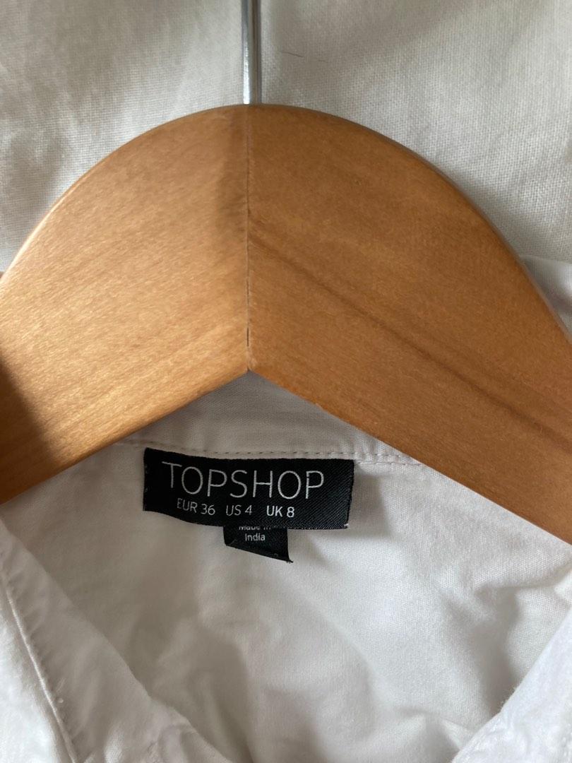 White button down (Category: Blouses) located in Singapore. Submitted by sellingpigs (Listing ID 1194419486, Image 2). Description: White short sleeve button down No stains in good condition Good for work and/or casual fit UK8 .
