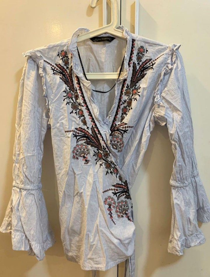 Zara blouse (Category: Blouses) located in Santa Rosa. Submitted by lenborbs (Listing ID 1194442912, Image 1). Description: Zara woman wrap around blouse,medium size but can also fit small and large NOTE: ALL ITEMS POSTED IS AVAILABLE UNLESS THERE IS A SOLD MARK.