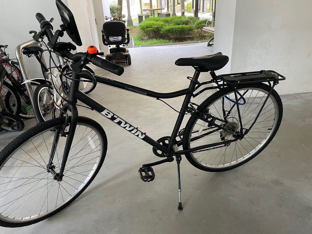 Btwin hybrid bike with child seat Sports Equipment Bicycles Parts Bicycles on Carousell