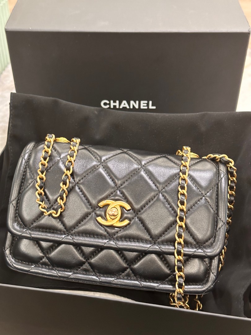 Chanel button on sale on top bag