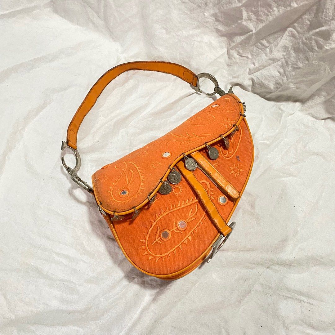 Christian dior orange saddle bag, Luxury, Bags & Wallets on Carousell