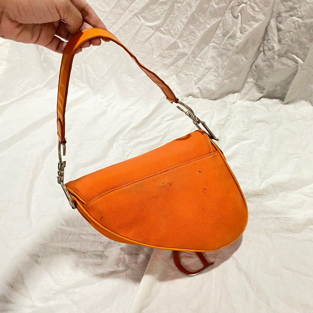 Christian dior orange saddle bag, Luxury, Bags & Wallets on Carousell