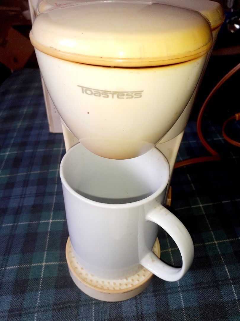 Imported TOASTESS 1 Cup Coffeemaker/ 110V (Category: Coffee Machines & Makers) located in Quezon City. Submitted by SELLER_QC (Listing ID 1199489431, Image 2). Description: Imported TOASTESS 1 Cup Coffeemaker/ 110V Description • Includes: white ceramic mug, permanent filter & instruction manual • Includes a permanent well-used nylon coffee filter. No more paper filters required. • Perfect for coffee, tea, hot chocolate and more • Brews directly i