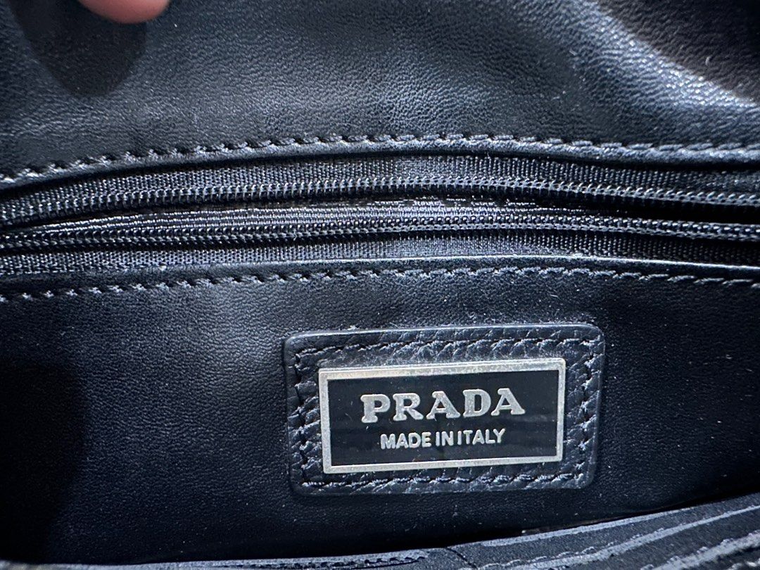 Xmas promo sales-Prada clutch bag, Luxury, Bags & Wallets on Carousell