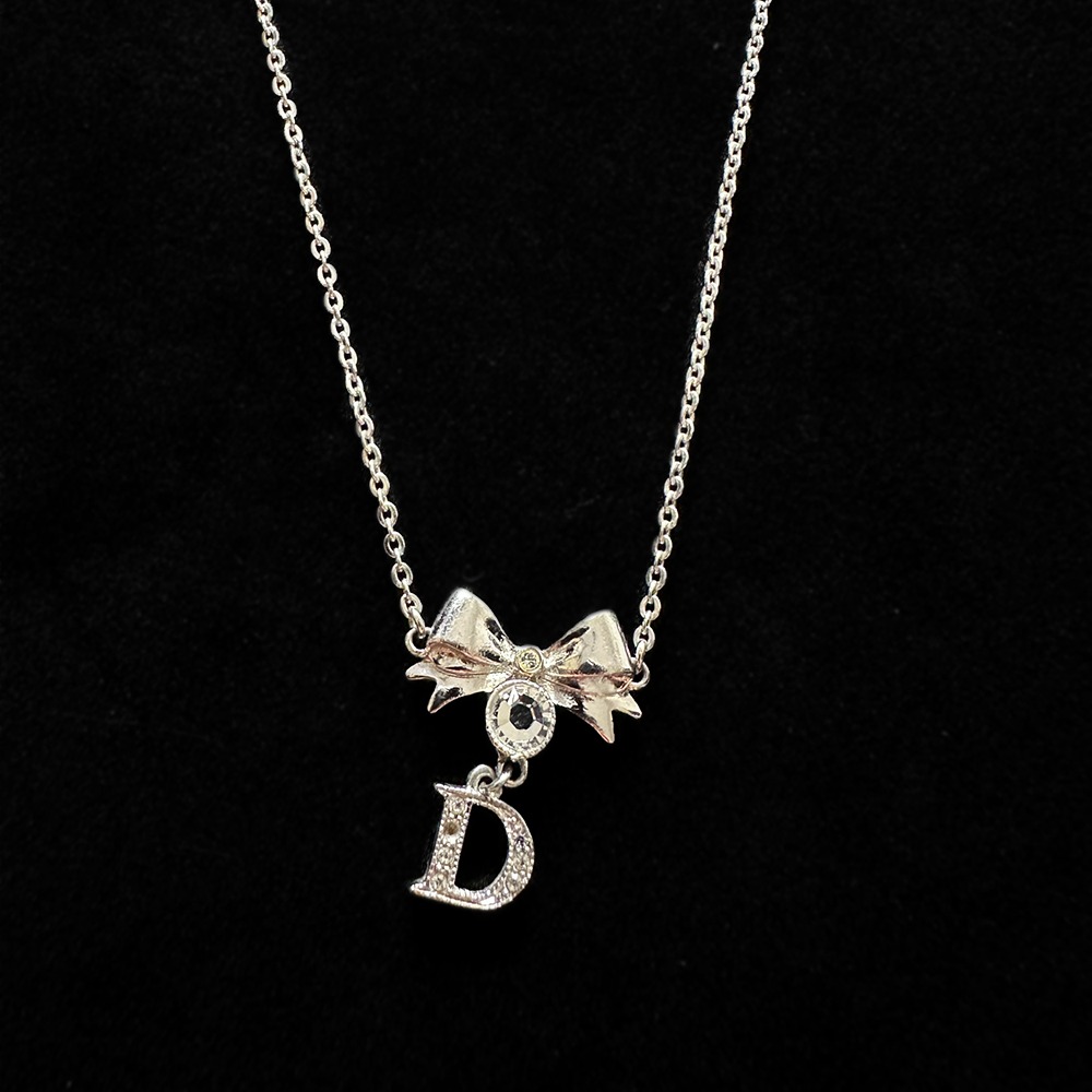 Authentic Vintage Christian Dior Silver Ribbon Necklace with
