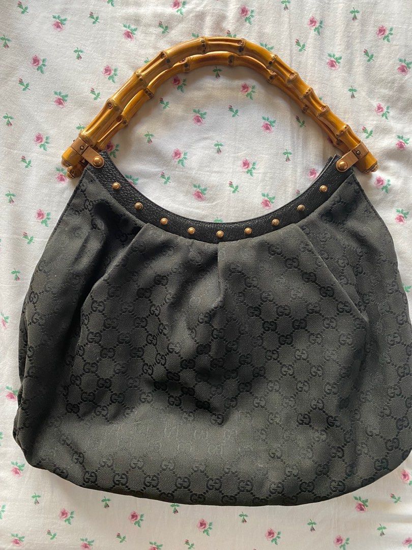 Gucci Bamboo Handle - Authentic (Category: Luxury Bags & Wallets) located in Paranaque City. Submitted by fancyshit (Listing ID 1194617449, Image 2). Description: Lightly used Gucci Bamboo handle. With serial code. Slightly Negotiable. MOP: Gcash/BDO MOD: Lalamove/Gogo Express.