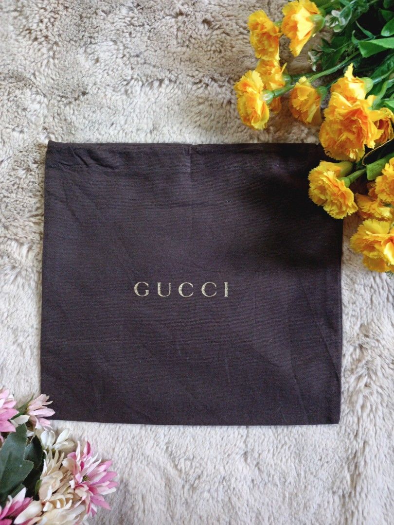 Gucci wallet dust bag top