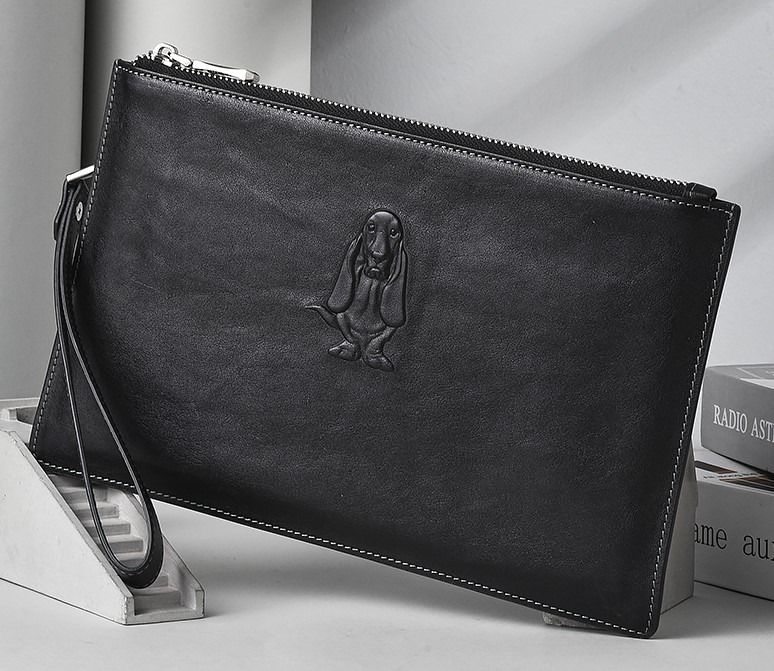 Clutch bag sales hush puppies