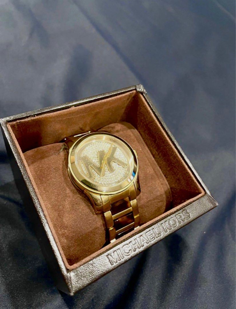 MK watch gold and leopard print