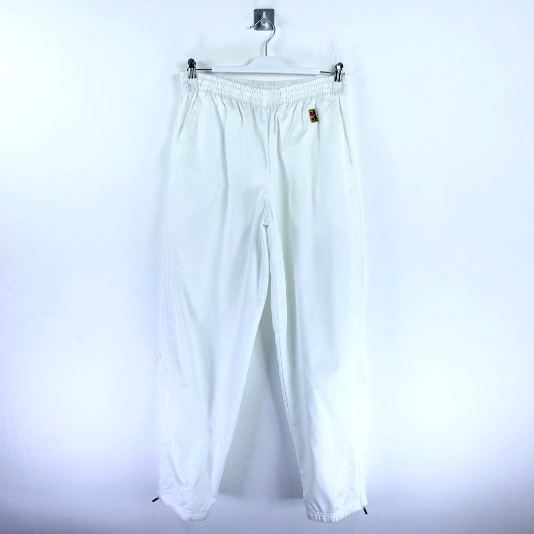 Nike track pants with ankle sales zipper