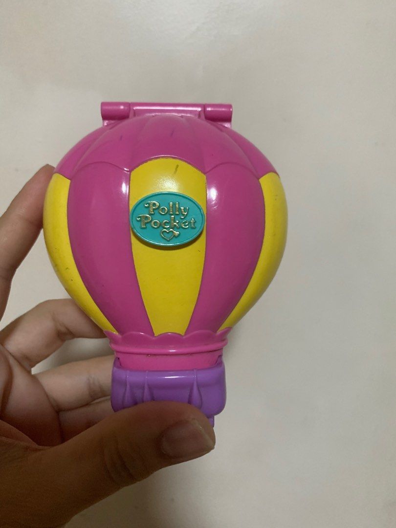 Polly Pocket Up Up and Away (Category: Kids Toys) located in Manila. Submitted by mysweetcorner (Listing ID 1194689543, Image 1). Description: Complete and in very good condition 💜Boat moves and umbrella rotates 💜Complete dolls and parts Price: 2500 MOP: Gcash or BDO Shipping: Grab or LBC Cross posted.