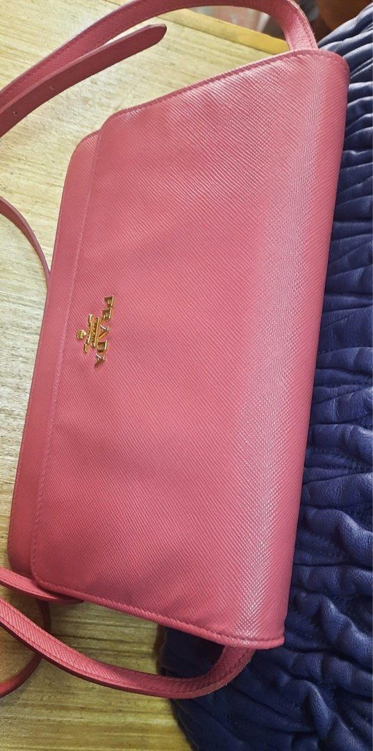 Prada WOC fuchsia pink sling bag (Category: Luxury Bags & Wallets) located in Butuan. Submitted by natalday (Listing ID 1194664262, Image 1). Description: authentic new condition .