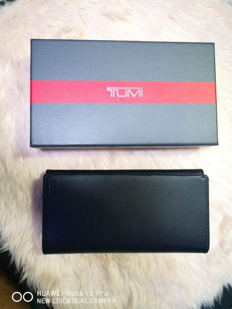 Tumi breast pocket leather and ballistic nylon wallet 8,500 to 12
