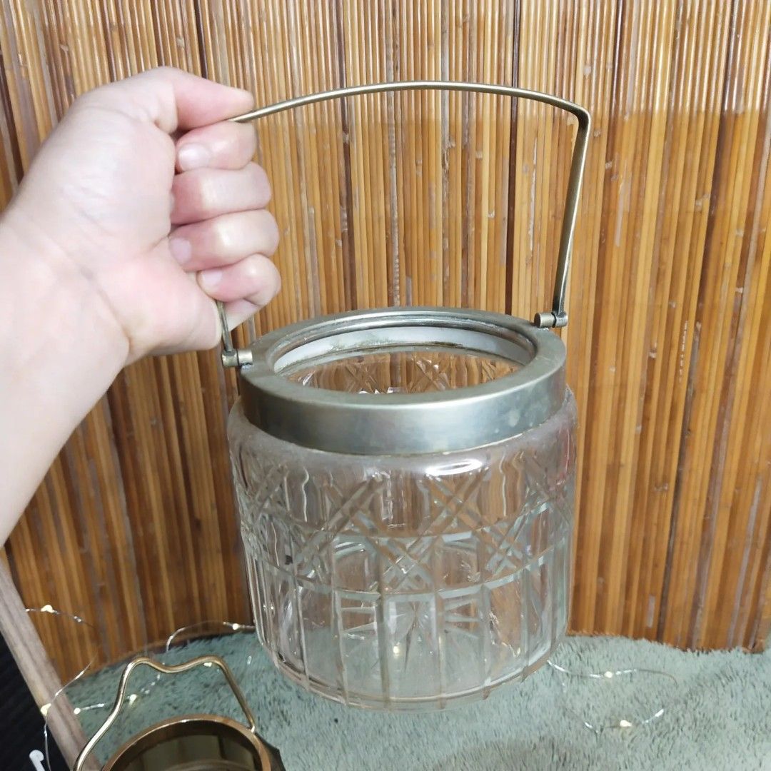2 Jars with Handle (Category: Water Bottles & Tumblers) located in Malolos. Submitted by jestrelita (Listing ID 1194935018, Image 3). Description: 2 Jars with Handle P380 both - 1 big large glass jar with handle - 1 small plastic jar with handle - flower vase/ice bucket/candle holder - good condition 👍💯👍💯👍💯👍.
