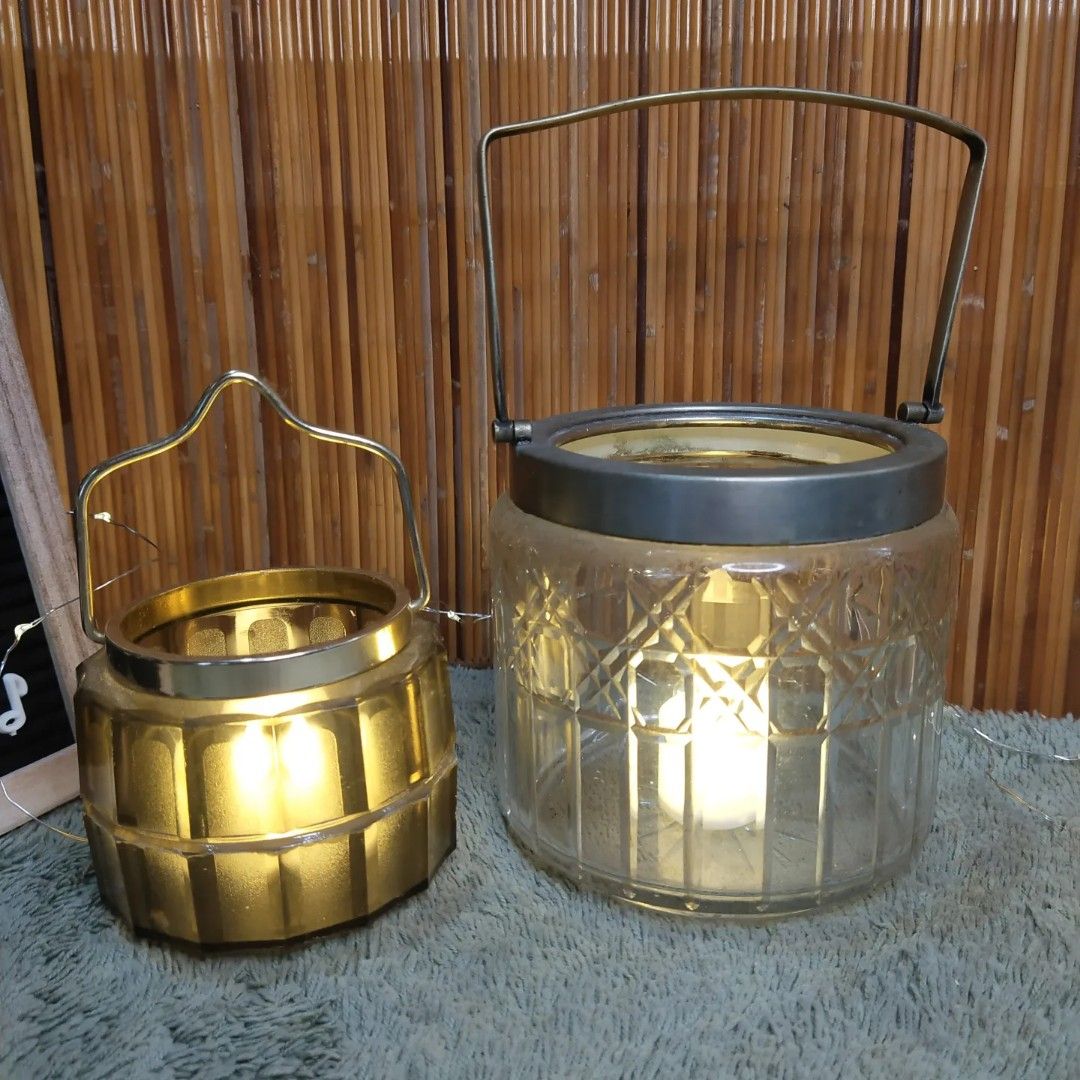 2 Jars with Handle (Category: Water Bottles & Tumblers) located in Malolos. Submitted by jestrelita (Listing ID 1194935018, Image 2). Description: 2 Jars with Handle P380 both - 1 big large glass jar with handle - 1 small plastic jar with handle - flower vase/ice bucket/candle holder - good condition 👍💯👍💯👍💯👍.