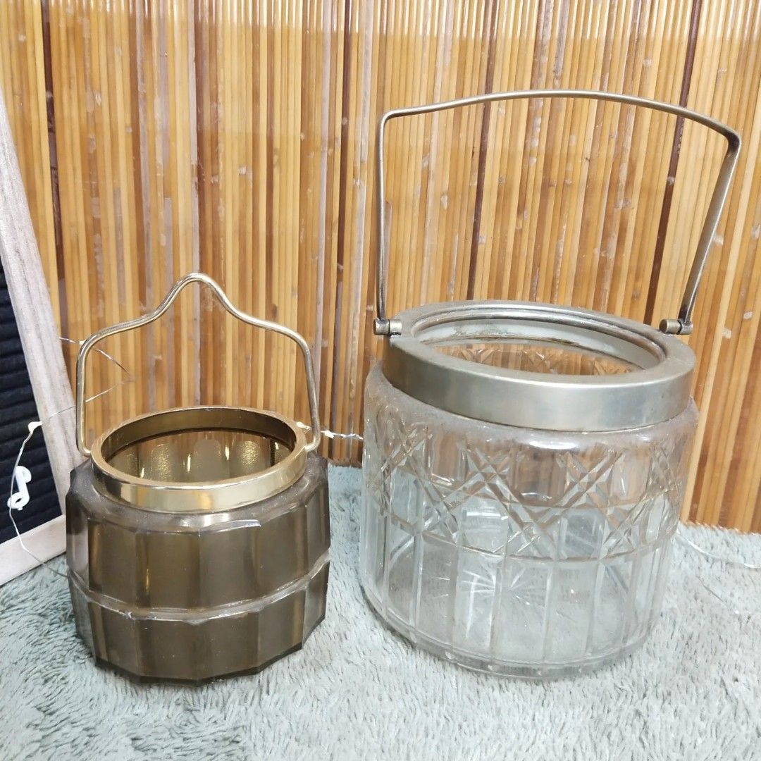 2 Jars with Handle (Category: Water Bottles & Tumblers) located in Malolos. Submitted by jestrelita (Listing ID 1194935018, Image 1). Description: 2 Jars with Handle P380 both - 1 big large glass jar with handle - 1 small plastic jar with handle - flower vase/ice bucket/candle holder - good condition 👍💯👍💯👍💯👍.