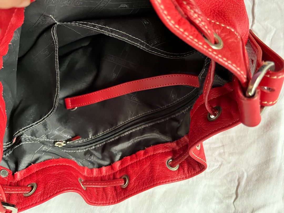 Longchamp Red Bucket Bag (Category: Luxury Bags & Wallets) located in Manila. Submitted by camillevanille (Listing ID 1194811114, Image 3). Description: Bought in Singapore Authentic .