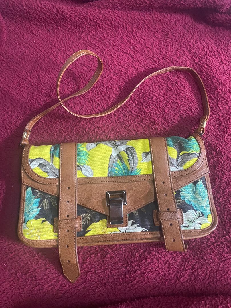 PROENZA clutch/shoulder bag (Category: Luxury Bags & Wallets) located in Cavite. Submitted by bagmarley (Listing ID 1194774553, Image 1). Description: Authentic Proenza Clutch/shoulder bag .