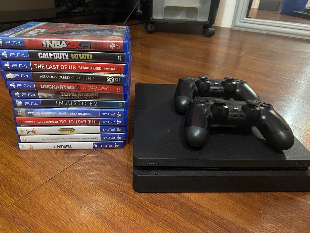 PS4 with 2 controllers and all games except horizon, Video Gaming