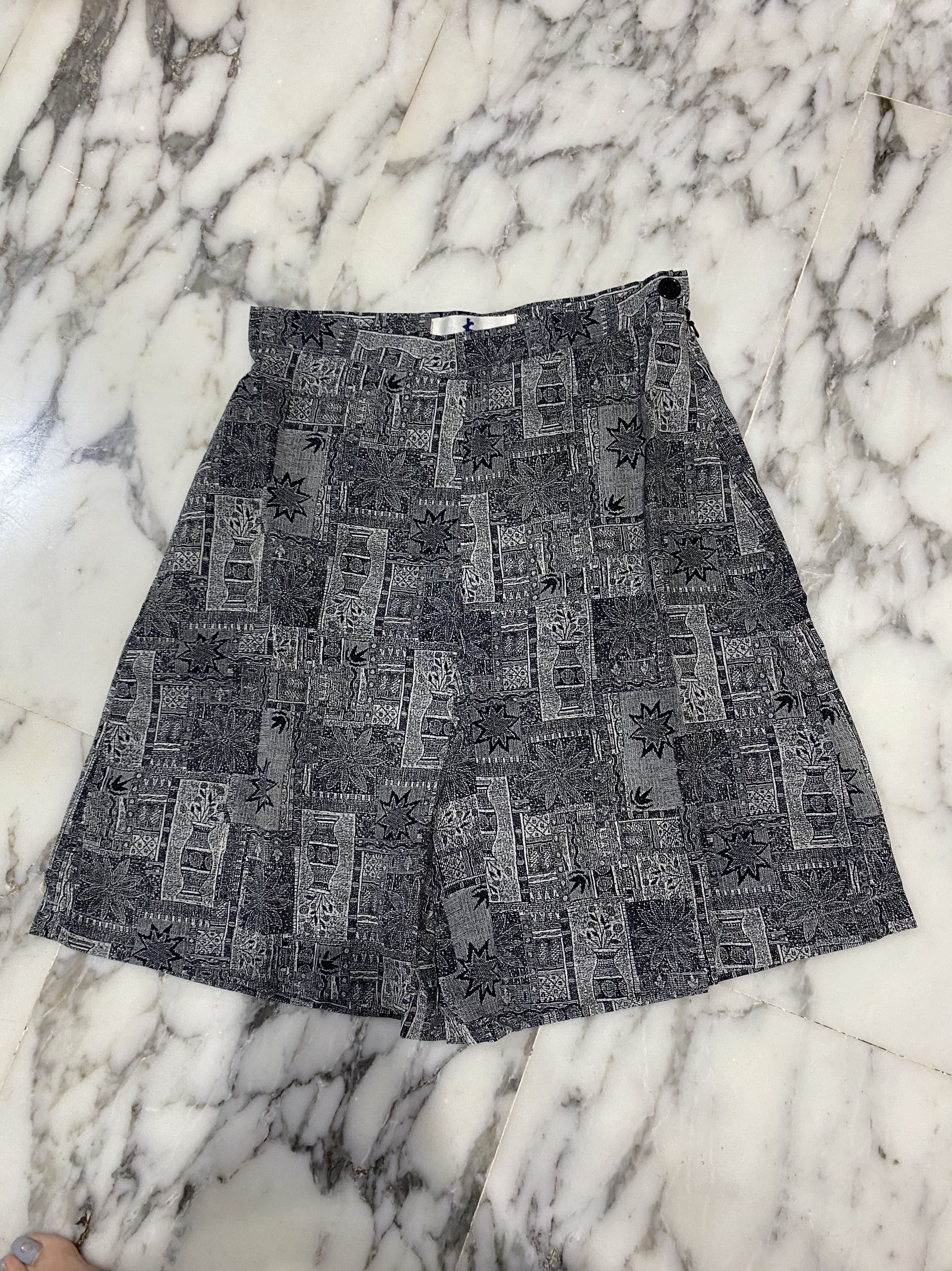 Skort (Category: Skirts) located in Singapore. Submitted by daisyclosett (Listing ID 1194911265, Image 1). Description: $6 mailed Brand new Size S Grey & black (slightly yellowish brown).