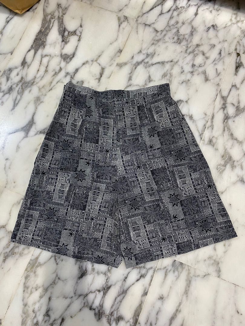 Skort (Category: Skirts) located in Singapore. Submitted by daisyclosett (Listing ID 1194911265, Image 2). Description: $6 mailed Brand new Size S Grey & black (slightly yellowish brown).
