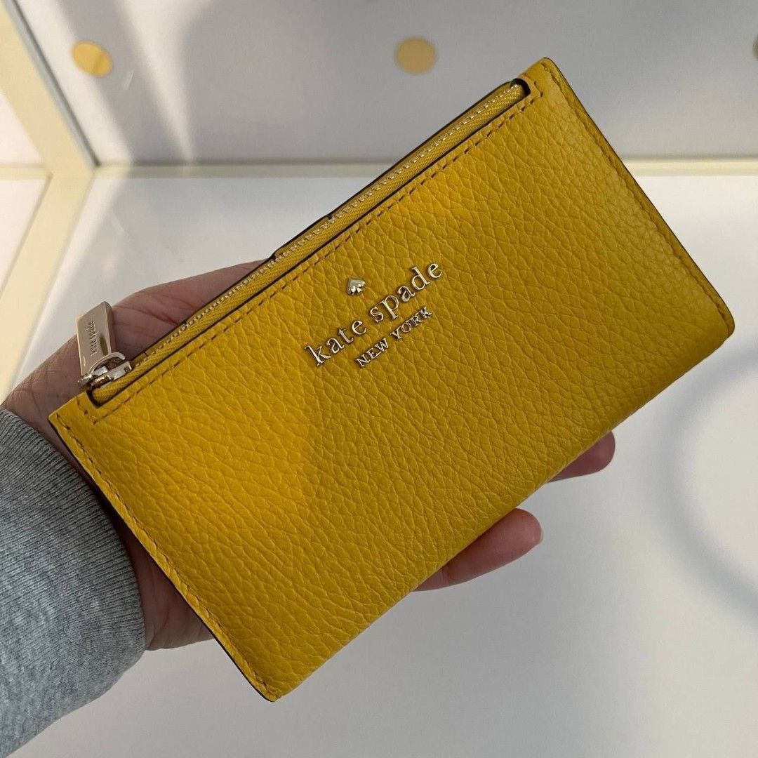 CLEARANCE SALE KATE SPADE Leila small slim bifold wallet in yellow