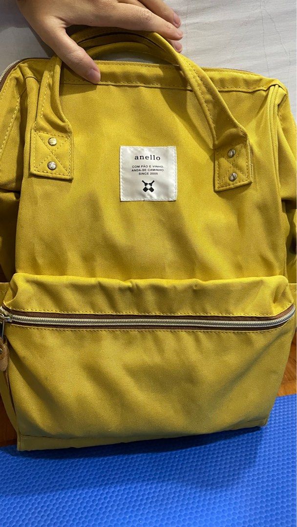 Mustard Anello Backpack, Women's Fashion, Bags & Wallets, Backpacks on