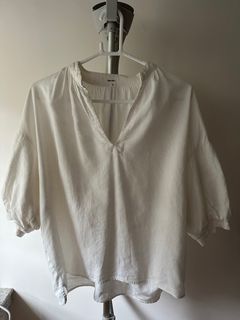 niko and white mid-sleeve top with cropped front and longer back design64235213249921110