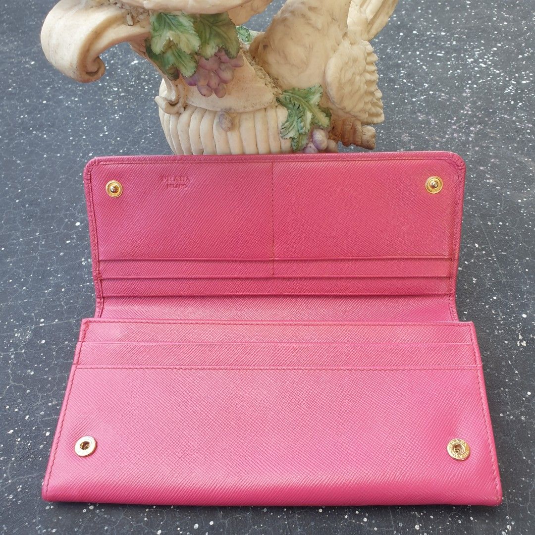 Original Prada Saffiano Bow Flap Wallet (Category: Luxury Bags & Wallets) located in Cabanatuan. Submitted by meyrasol (Listing ID 1195024405, Image 3). Description: comes with box no card.