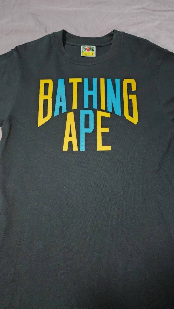 A Bathing Ape Tee (Category: Tshirts & Polo Shirts) located in Singapore. Submitted by headporter (Listing ID 1195259334, Image 2). Description: Authentic BAPE Tee Still in good condition Reason for selling: can't fit S size anymore 😭.