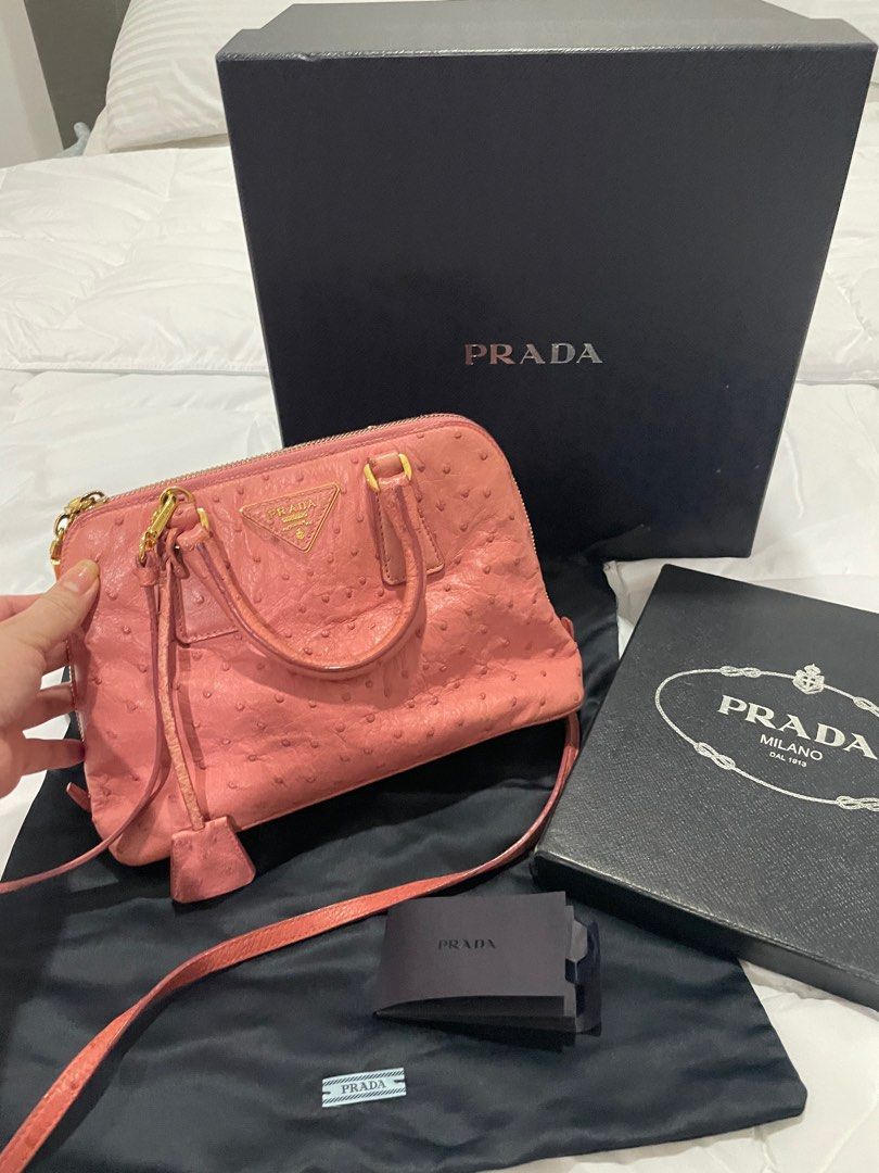 Authentic Exotic Prada Ostrich Struzzo mini dome bag (Category: Luxury Bags & Wallets) located in Bacolod City. Submitted by houseoflouvre (Listing ID 1195318551, Image 2). Description: Authentic Exotic Prada Struzzo Blush pink dome bag Comes with box, tissues, dustbag, strap Price: 85k .