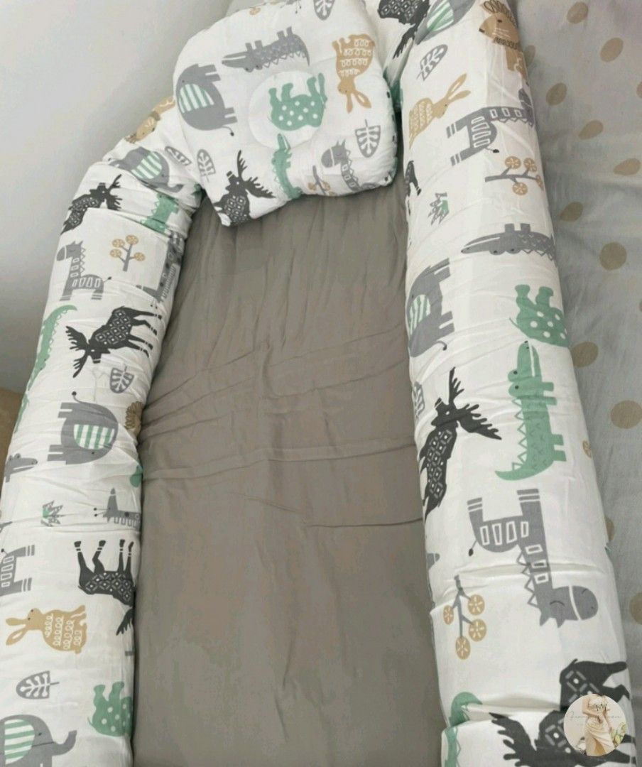 Baby Crib nest with pillow (Category: Cots & Cribs) located in Marilao. Submitted by majoriety (Listing ID 1191253396, Image 2). Description: di po nagamit yun pillow & bed blanket (used) animal print 80×50cm kakabili lng, mas gusto ni baby sa duyan gcash shapee chec k out https://shope.ee/408NYanEpt.
